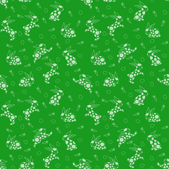Naklejka premium Seamless pattern with white rabbits over green