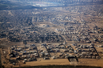 Fototapeta premium Aerial view of apartment houses in Dubai city (United Arab Emira