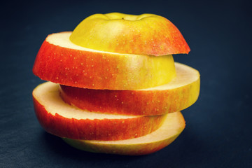 Fototapeta na wymiar sliced apple on black background