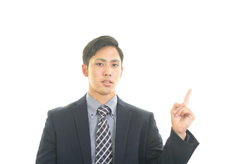 指をさすビジネスマン