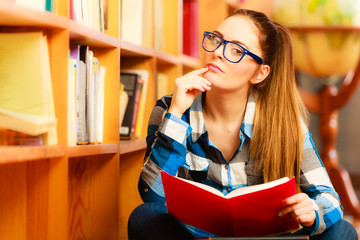 Woman student in college library