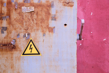 rusty electrical box on  pink background wall