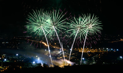 Fireworks on night city background