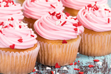 Pink Valentines Day cupcakes with sprinkles