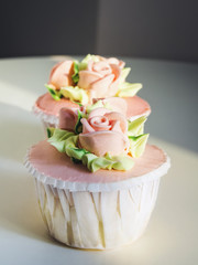 Cup cake dessert with Rose and flower decoration.