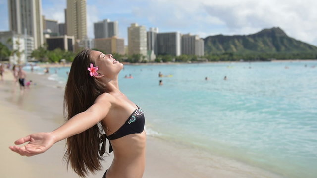 Enjoyment - beach woman on Waikiki, Oahu, Hawaii