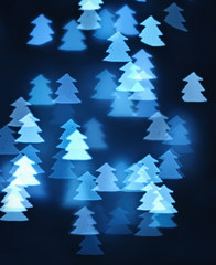 Obraz premium Defocused abstract blue christmas form of a New Year's fir-tree