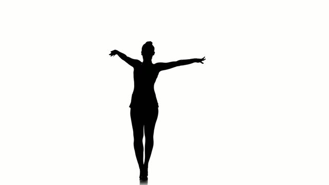 Sport  beautiful girl jumping and doing professional exercises