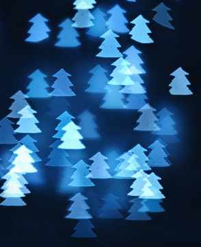 Defocused abstract blue christmas form of a New Year's fir-tree