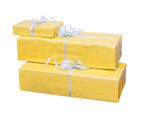 gift in yellow packing with a white bow