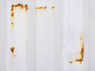 White corrugated iron metal texture with Rust Frame corner on su