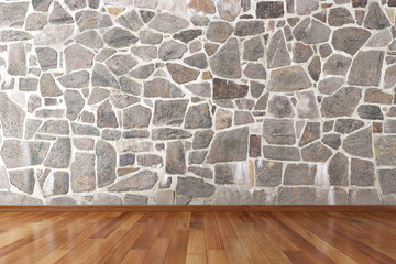 Empty room with stone wall and wooden floor