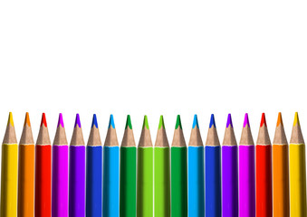 Colored pencils, sorted, on white background.