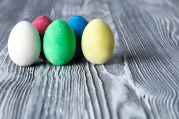 Easter eggs. Vintage gray wood background. (Soft focus)