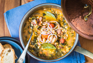Soup with different vegetables, beans, kale, tuscan soup.