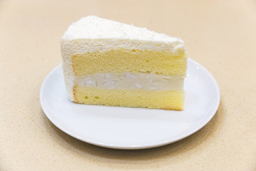 fresh piece of coconut cream cake