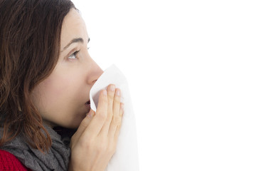 Woman with cold sneezing