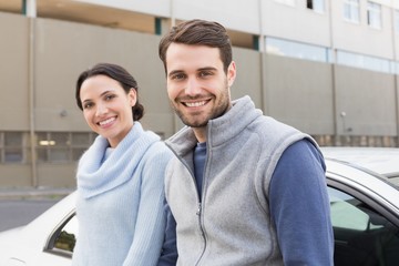 Young couple smiling at the camera