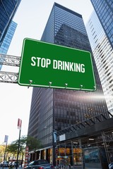 Fototapeta na wymiar Stop drinking against skyscraper in city
