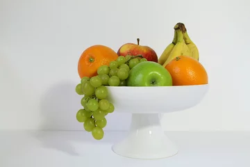 Foto op Plexiglas fruitschaal met fruit © Hennie36