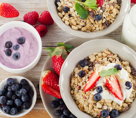 Muesli,  ripe berries and yogurt for healthy  breakfast