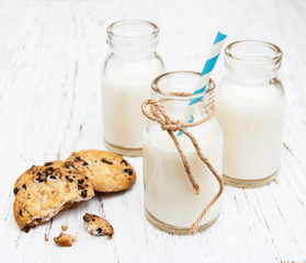 Bottles of milk and cookies