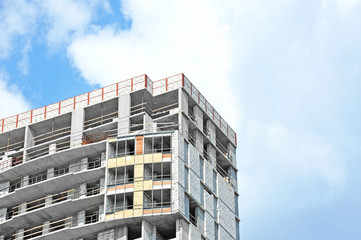Fototapeta premium Building construction site work against blue sky