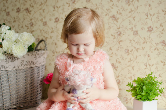 little girl with toy