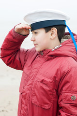 boy in a peaky cap of the sea cabin boy
