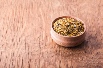 spice salt in a wooden bowl