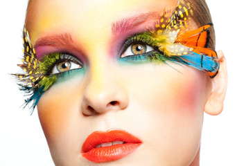 Woman with false feather eyelashes makeup