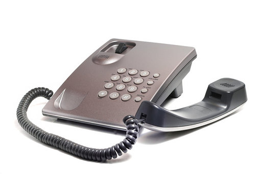 landline phone of gray on a white background