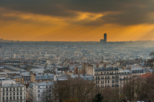 paris sky line with sun rays