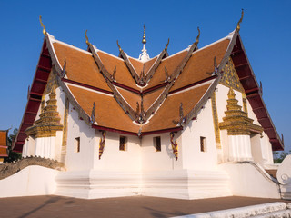 Church of Wat Phu Mintr under blue sky