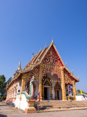 Northern Thai art temple under blue sky