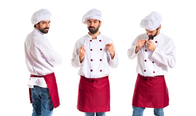 Confident chef over white background