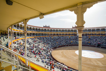 Fototapeta premium Plaza de Toros de Las Ventas interior view with tourists gatheri