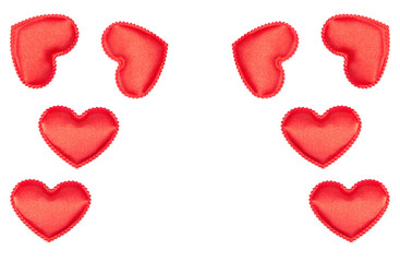 Frame of bright red fabric hearts