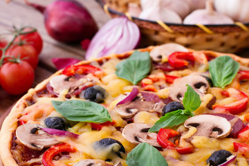 Pizza with seafood on wood table