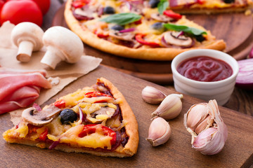 Pizza with seafood on wood table