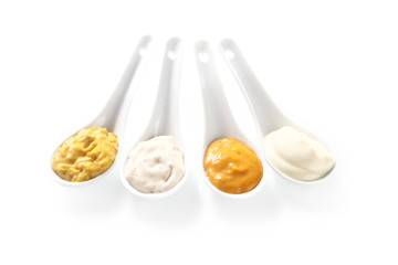 Spicy Pastes on White Serving Spoons
