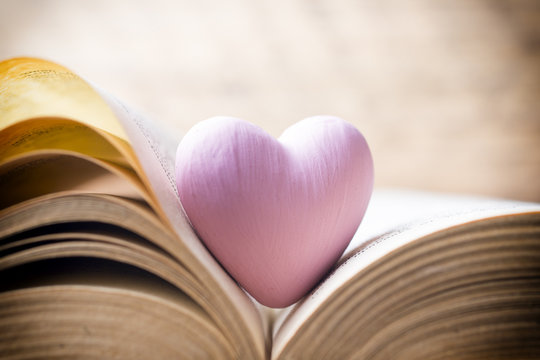 Pink heart of the book. Greeting cards.
