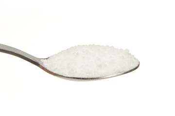 Salt (Sodium chloride) on a teaspoon