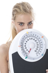 Model Released. Attractive Young Woman with Bathroom Scales