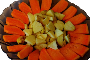 cut pieces of pumpkin and apple