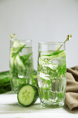 Glasses with fresh organic cucumber water