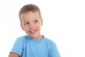 happy boy on a white background looking to the side