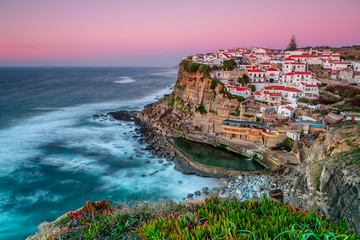 Sunset in the town Azenhas do Mar. With natural pool.