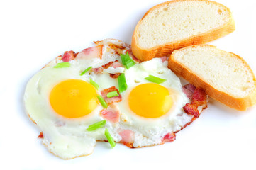 Two fried eggs and bacon