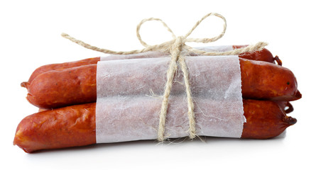 Smoked thin sausages, isolated on white